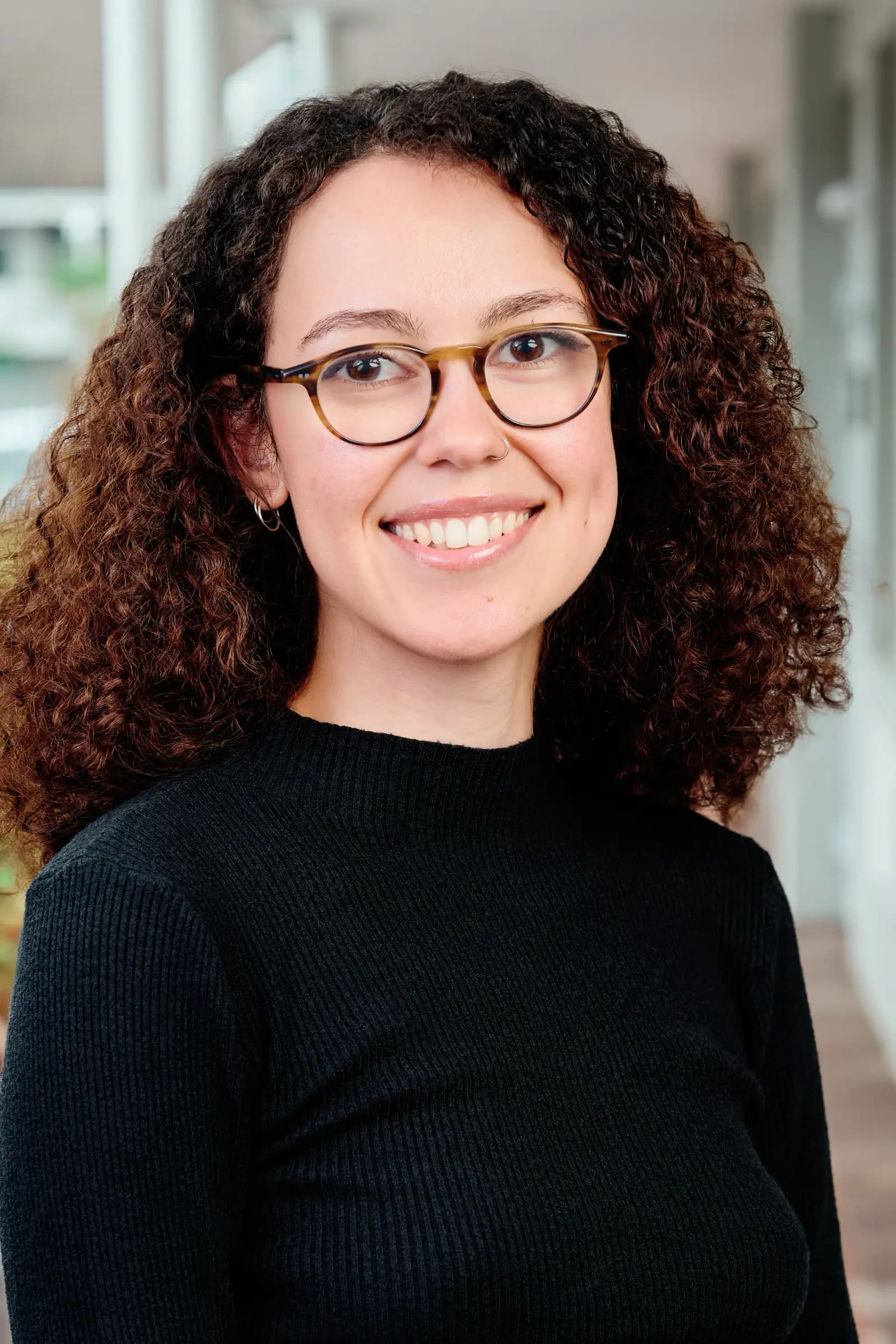 On-site corporate headshot photographer working with a Cape Town team during an office shoot